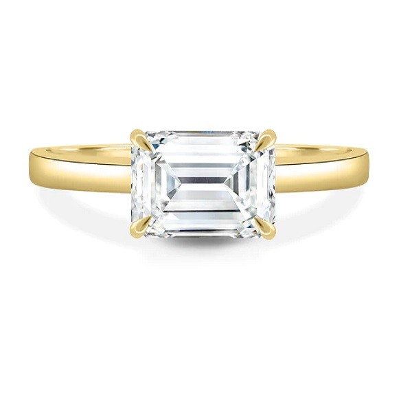 East West Emerald Solitaire Ring